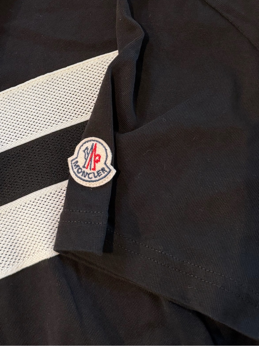 Moncler Black Tee with White Mesh Stripe Accent